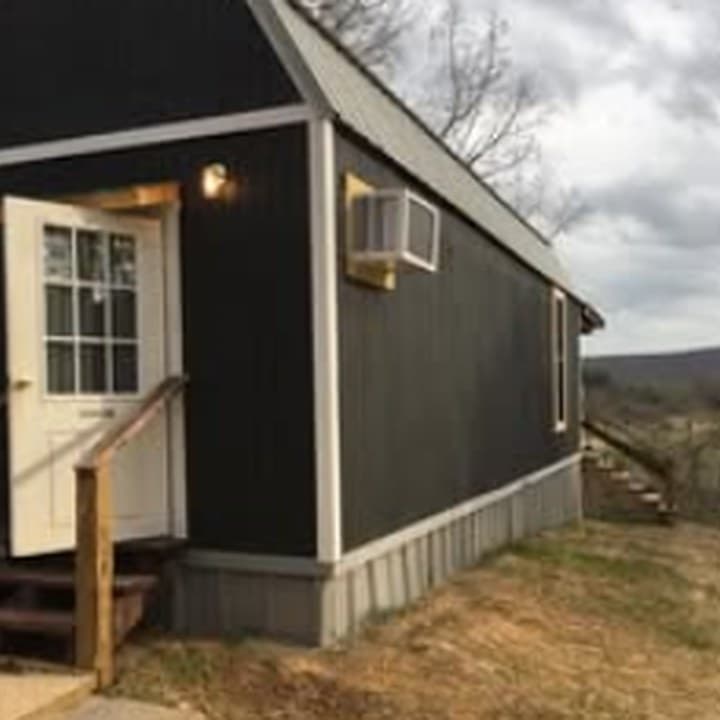 Cabin Two exterior surrounded by trees